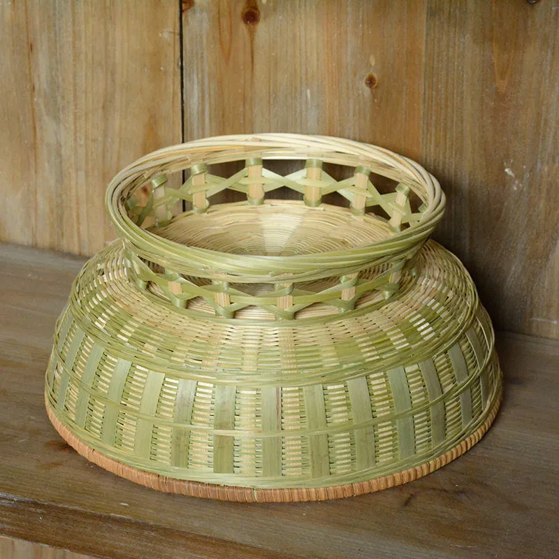 Handmade woven bamboo storage basket showing traditional craftsmanship and three size variations
