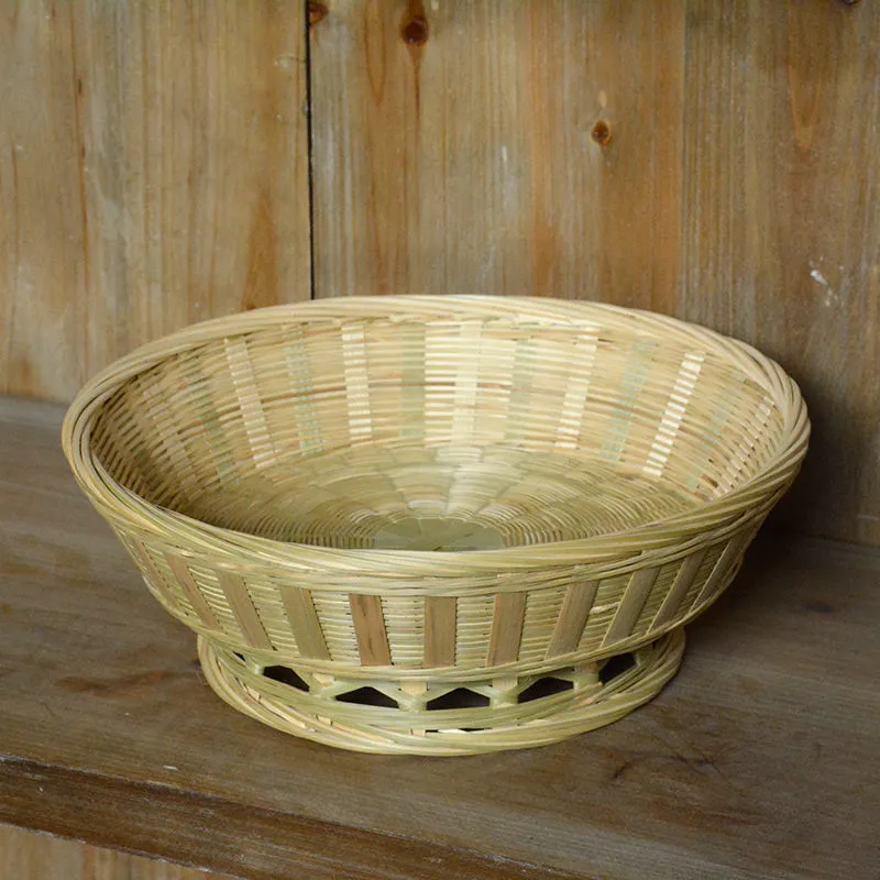 Handmade woven bamboo storage basket showing traditional craftsmanship and three size variations