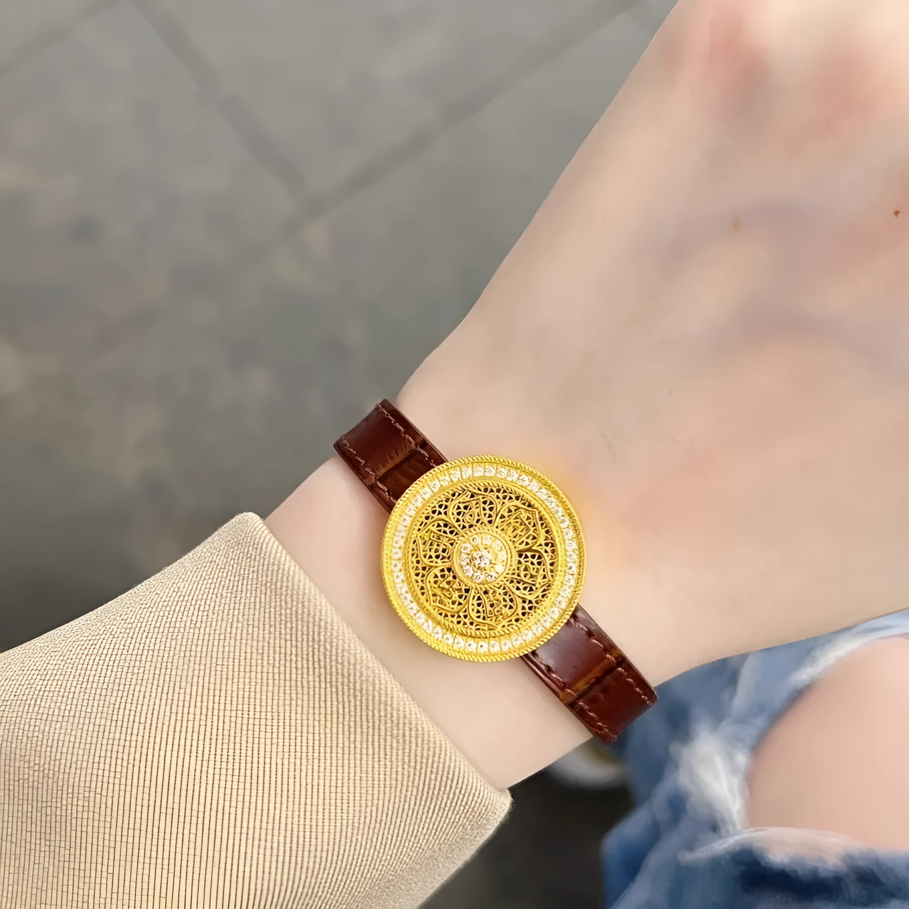 Gold plated eight-treasure compass watch chain with moissanite inlay on a black leather strap