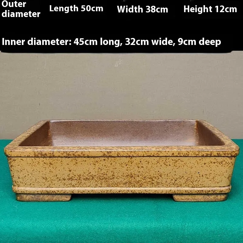 Straight-sided rectangular Yixing Zisha shallow flowerpot made of purple sand clay.