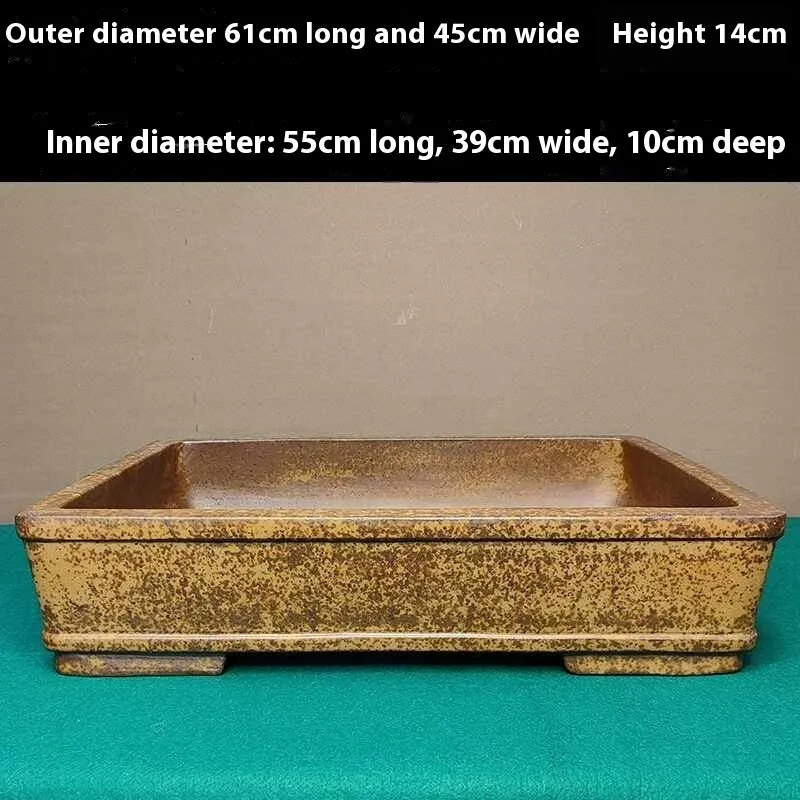 Straight-sided rectangular Yixing Zisha shallow flowerpot made of purple sand clay.