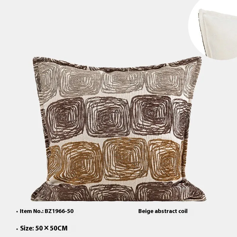 Cream and coffee coloured abstract coil pattern pillow cover shown in square and waist pillow sizes.