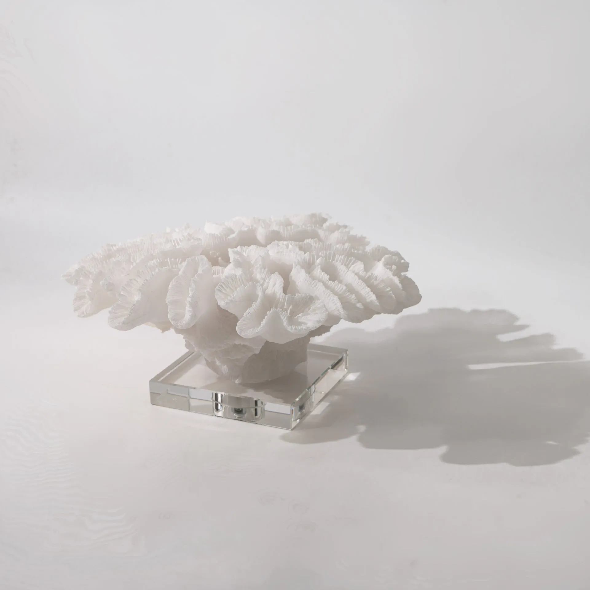Nordic modern light luxury resin coral ornament, white colour, 34x31x15cm, on a wooden desk