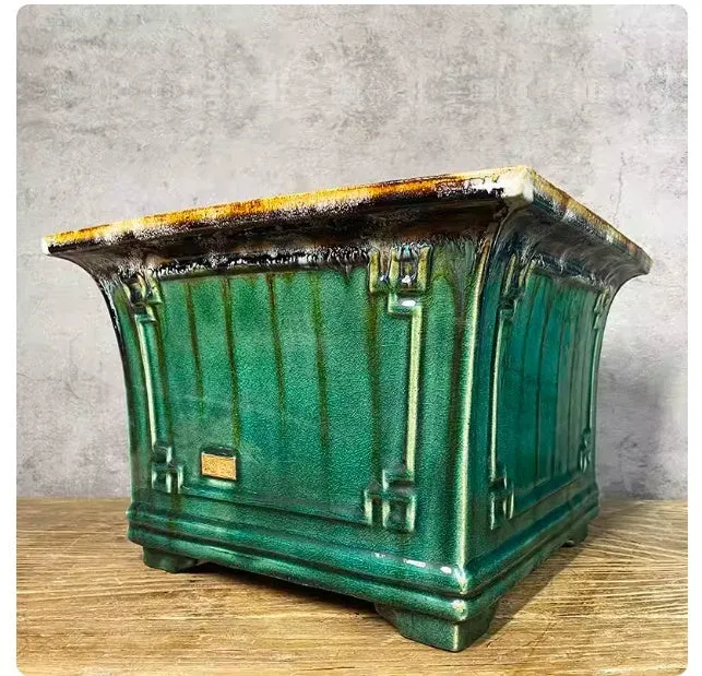 Ceramic square mouth flower pot with green crackle glaze finish, large size 36, on wooden surface