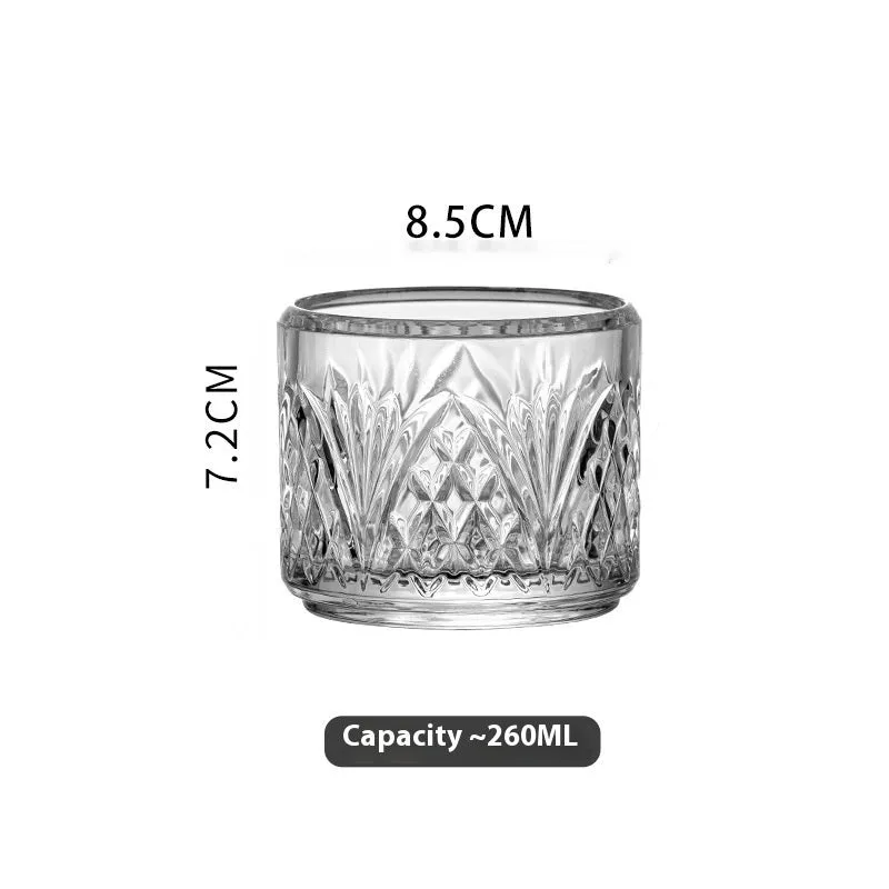 Clear glass whiskey wine set with striped and diamond pattern options on a table