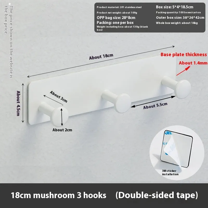 Black screwless adhesive wall hook with three hooks mounted on a glass shower door