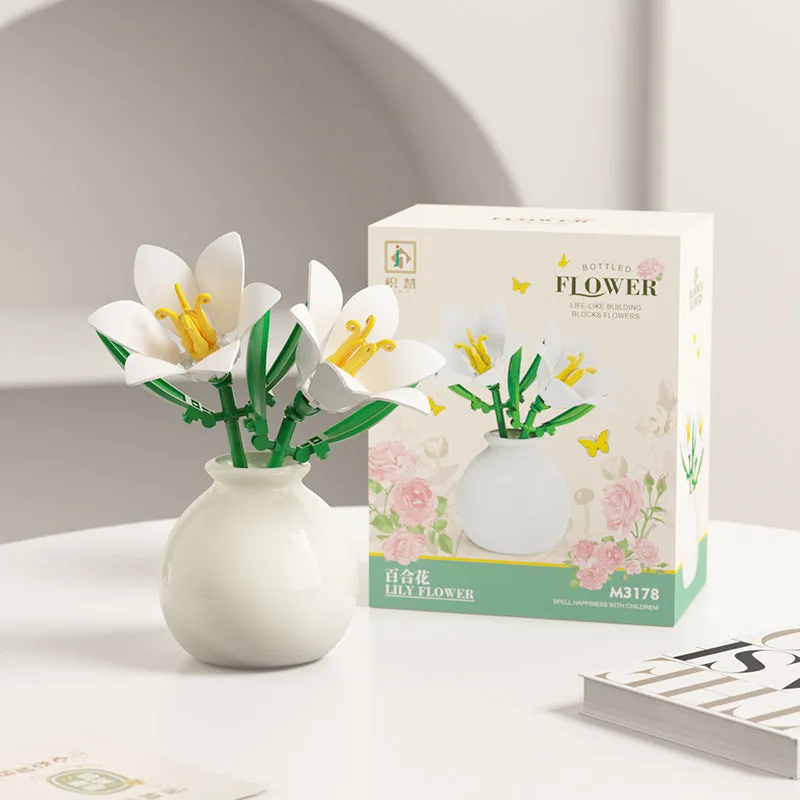 Assembled plastic building block flower in vase on tabletop