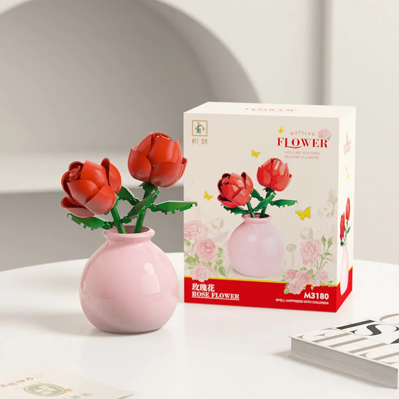 Assembled plastic building block flower in vase on tabletop