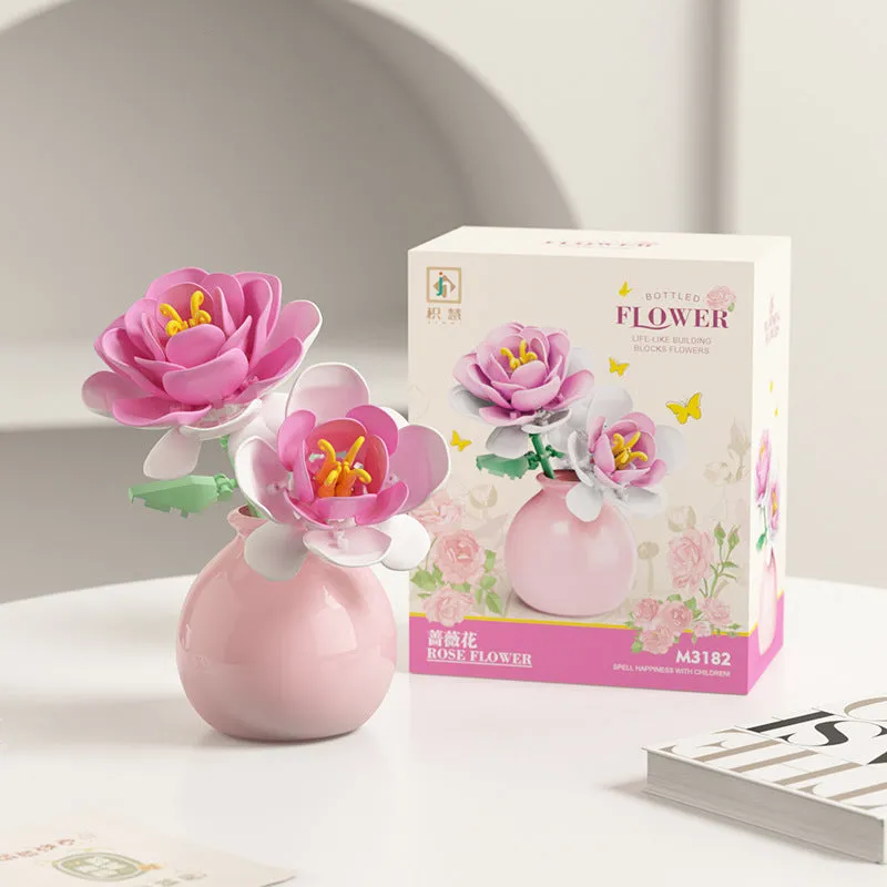 Assembled plastic building block flower in vase on tabletop