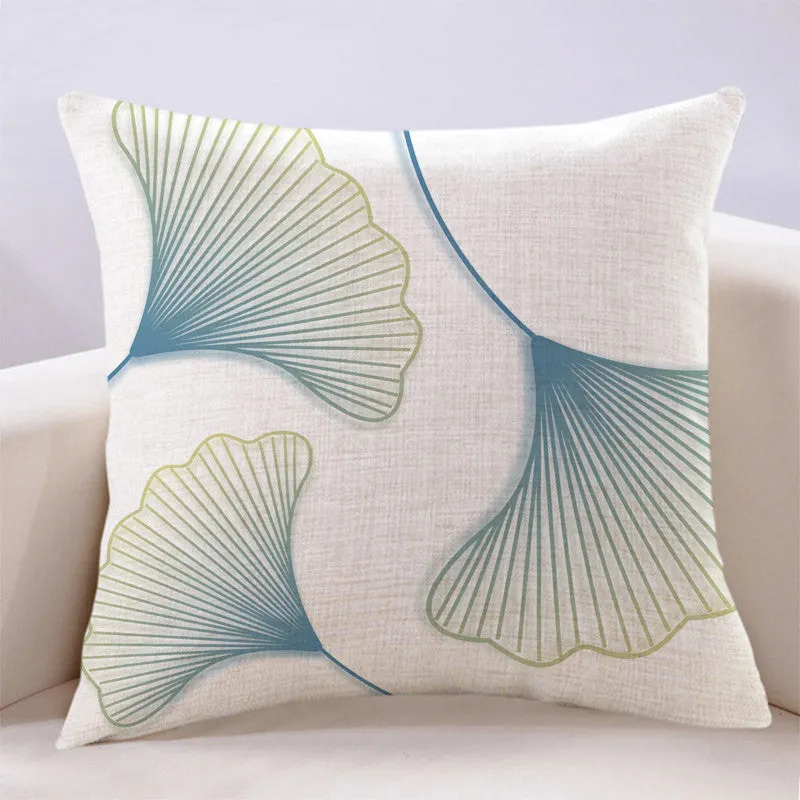 Ginkgo leaf printed square cushion cover on a sofa, available in multiple colours and sizes