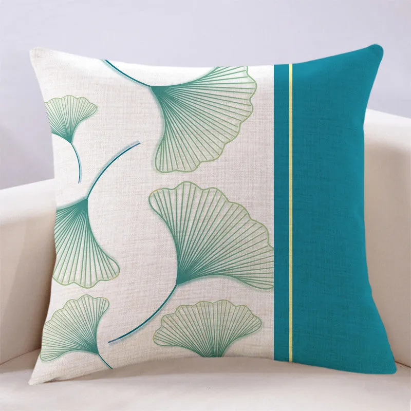 Ginkgo leaf printed square cushion cover on a sofa, available in multiple colours and sizes