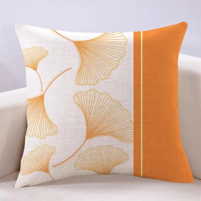 Ginkgo leaf printed square cushion cover on a sofa, available in multiple colours and sizes