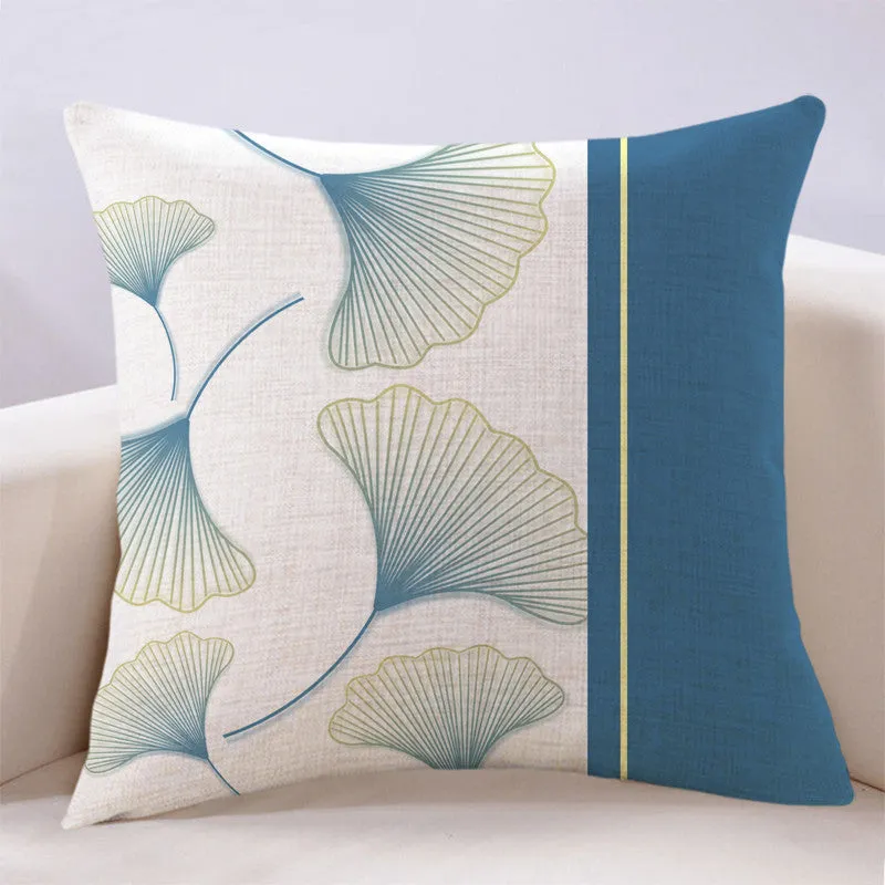 Ginkgo leaf printed square cushion cover on a sofa, available in multiple colours and sizes