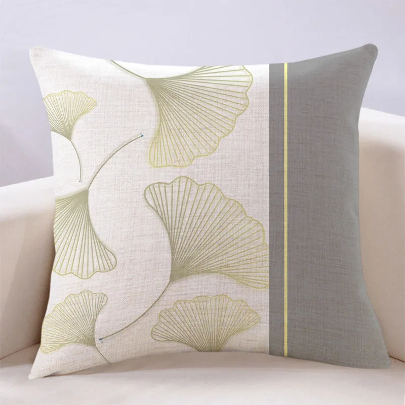 Ginkgo leaf printed square cushion cover on a sofa, available in multiple colours and sizes