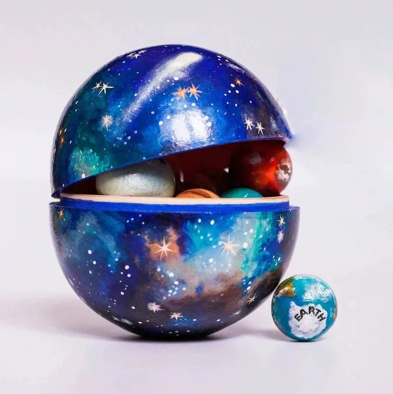 Planet Sun World plastic resin craft model in modern simplicity style on display