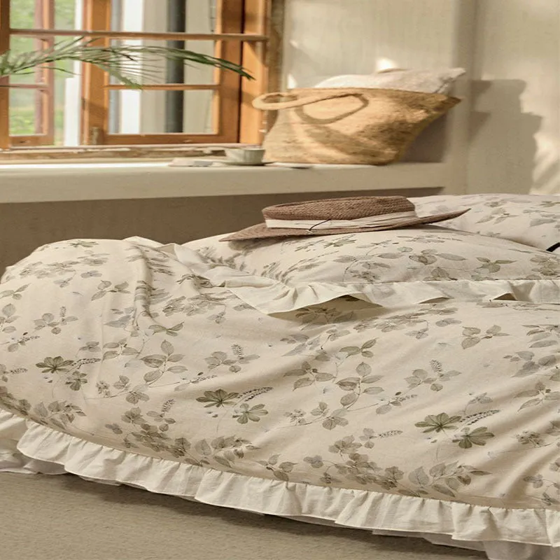 Cotton and linen yarn-dyed printed four-piece bedsheet set in raw jute colour with lace trim