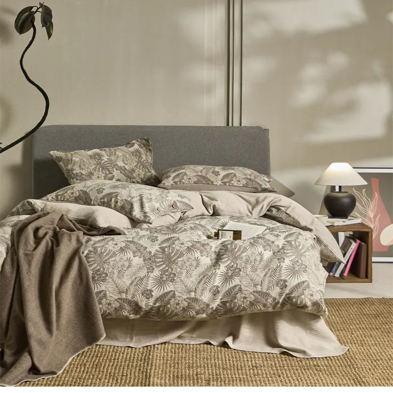 Linen cotton blend jacquard floral bedding four-piece set on a 1.5m double bed with quilt cover and pillowcases in neutral colours