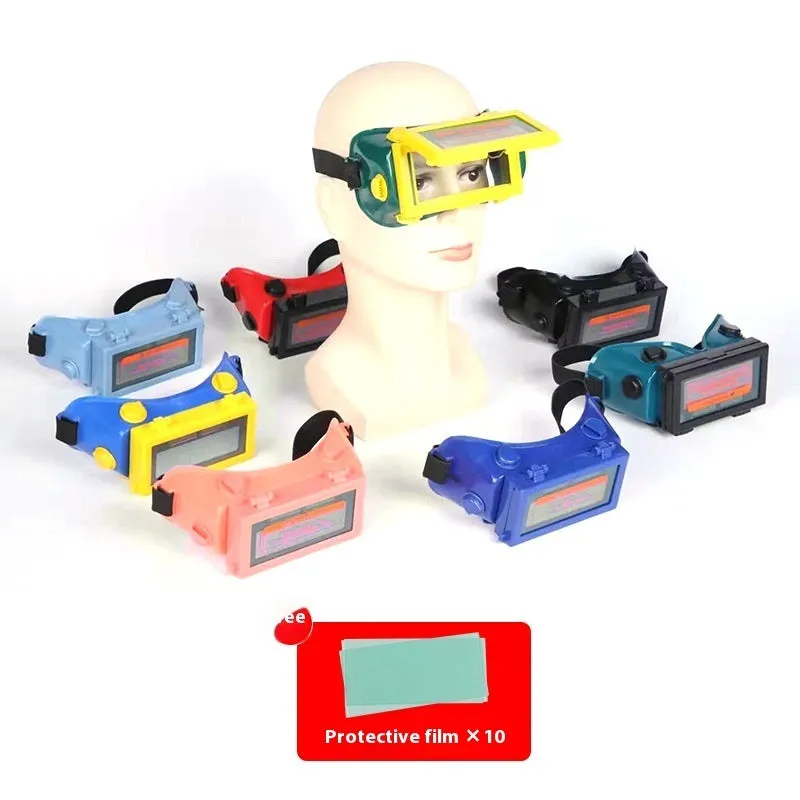 Light-changing electric welding glasses head-mounted type in green with flip dimmer and PVC frame