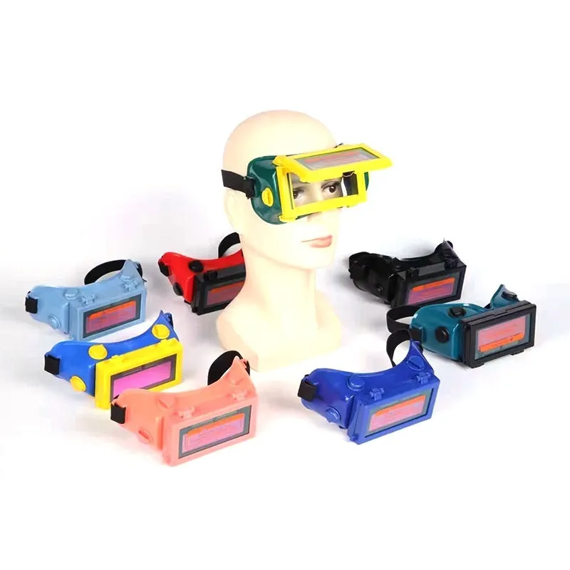 Light-changing electric welding glasses head-mounted type in green with flip dimmer and PVC frame