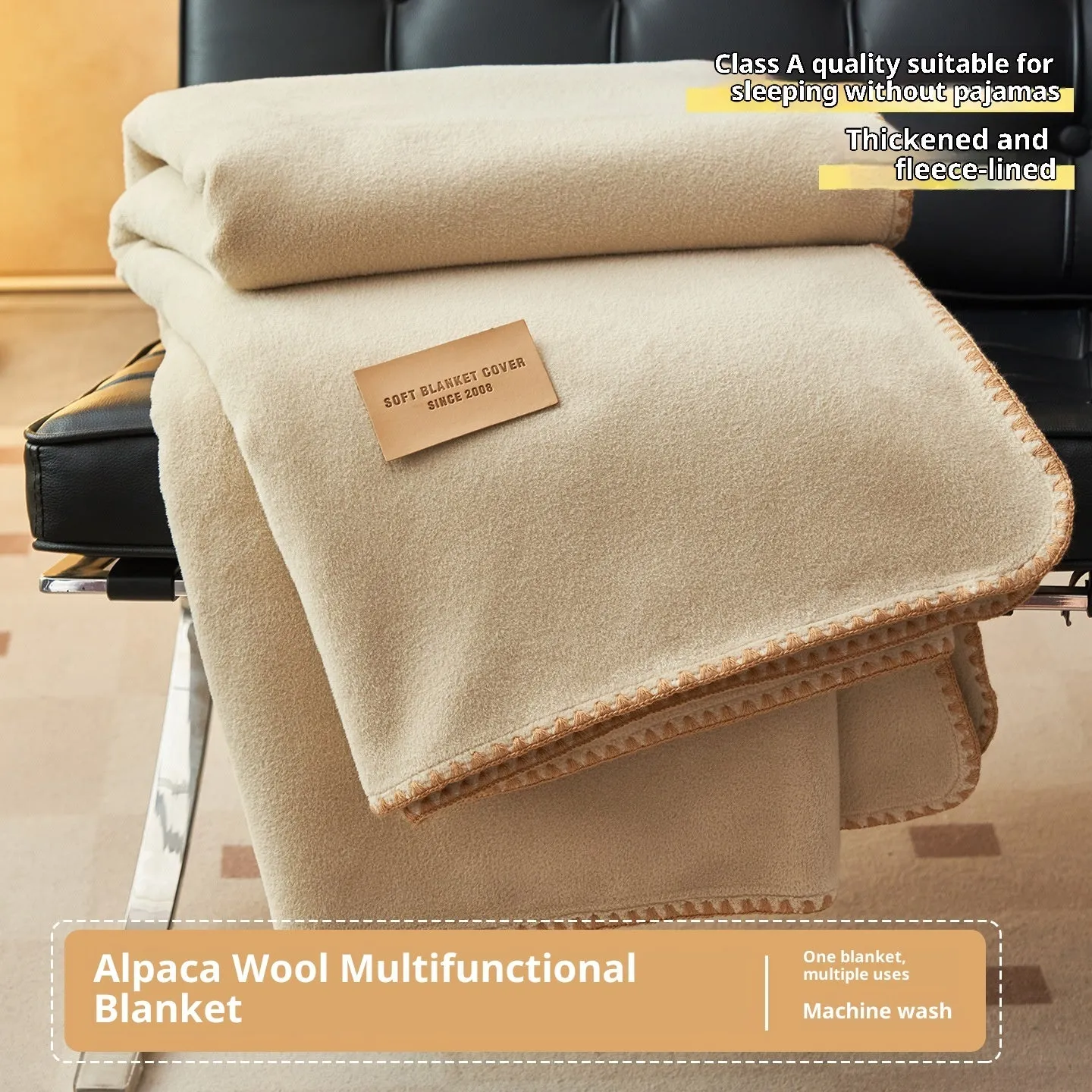 Class A Alpaca Fleecefiber blanket in solid colour, folded on a sofa, showing soft polyester texture