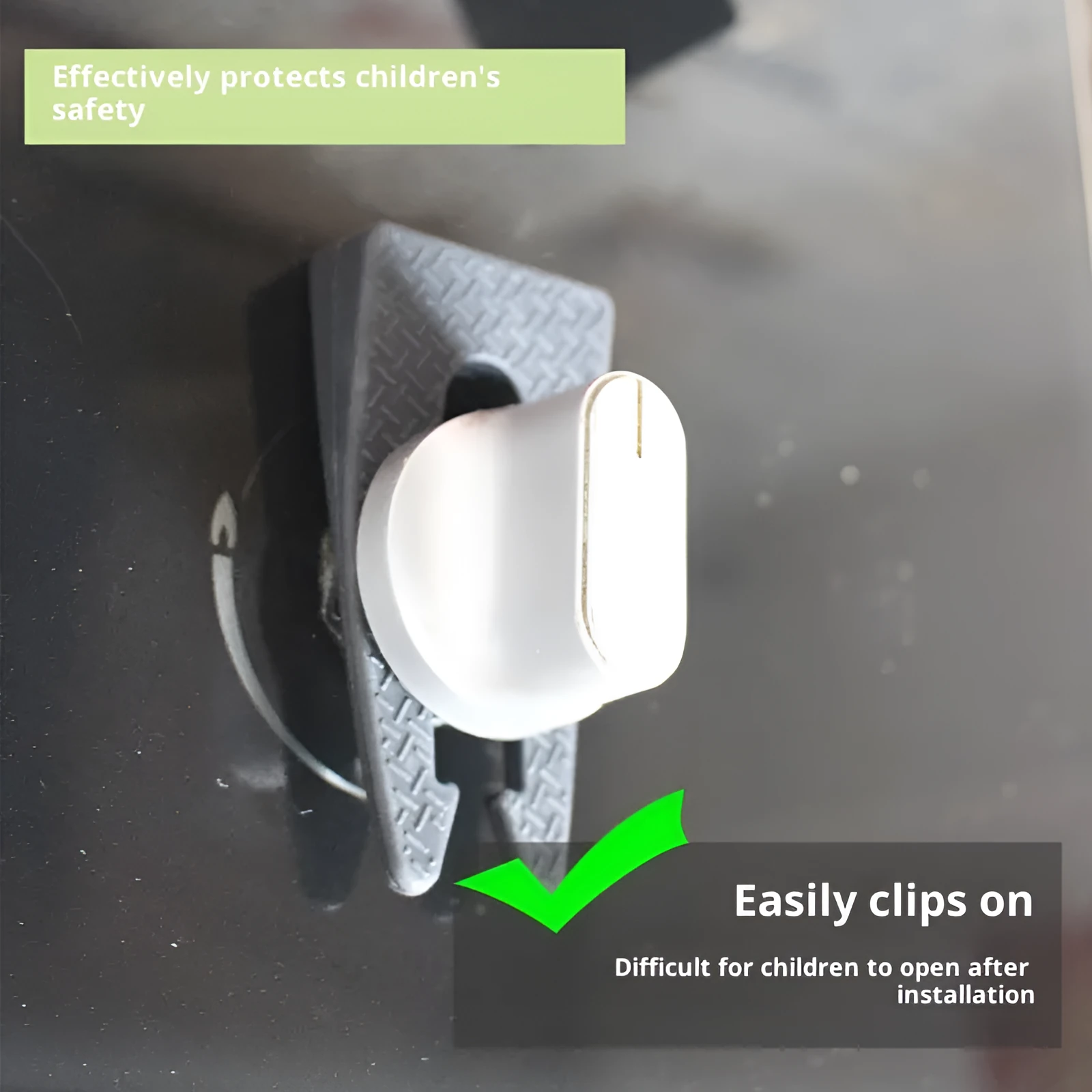 Gray plastic gas stove knob safety lock placed on a round kitchen stove knob