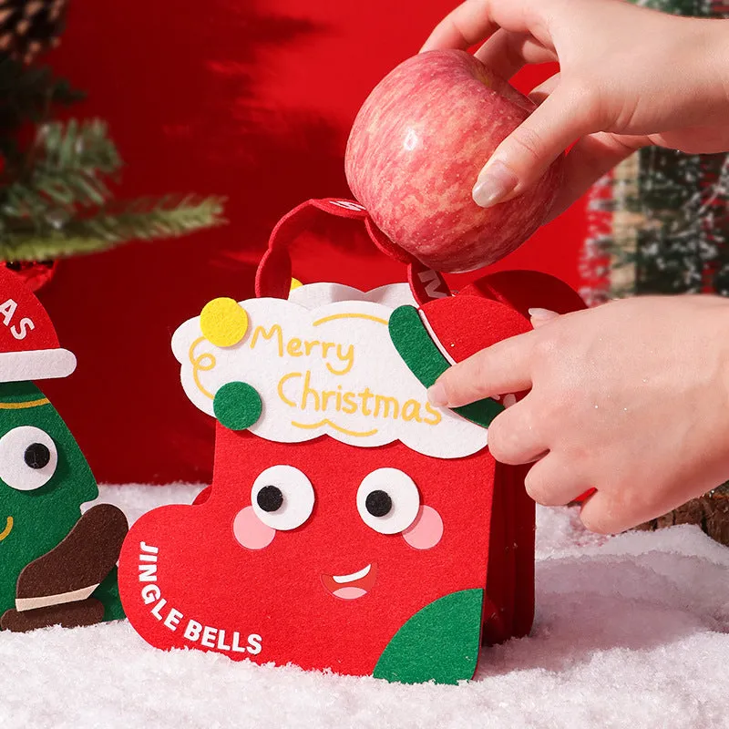 Green felt gift bag with cartoon Christmas design on a white background