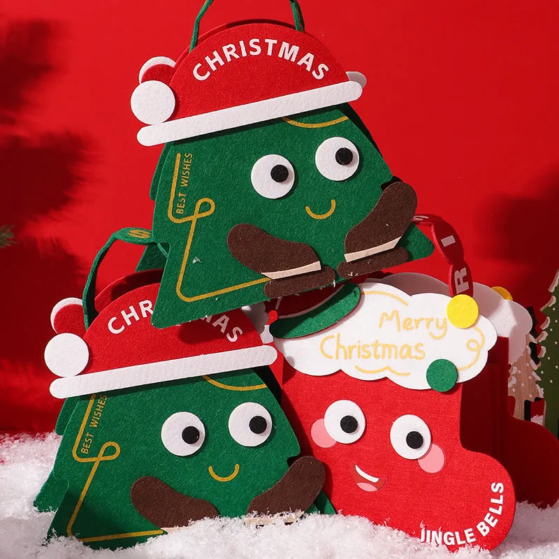 Green felt gift bag with cartoon Christmas design on a white background
