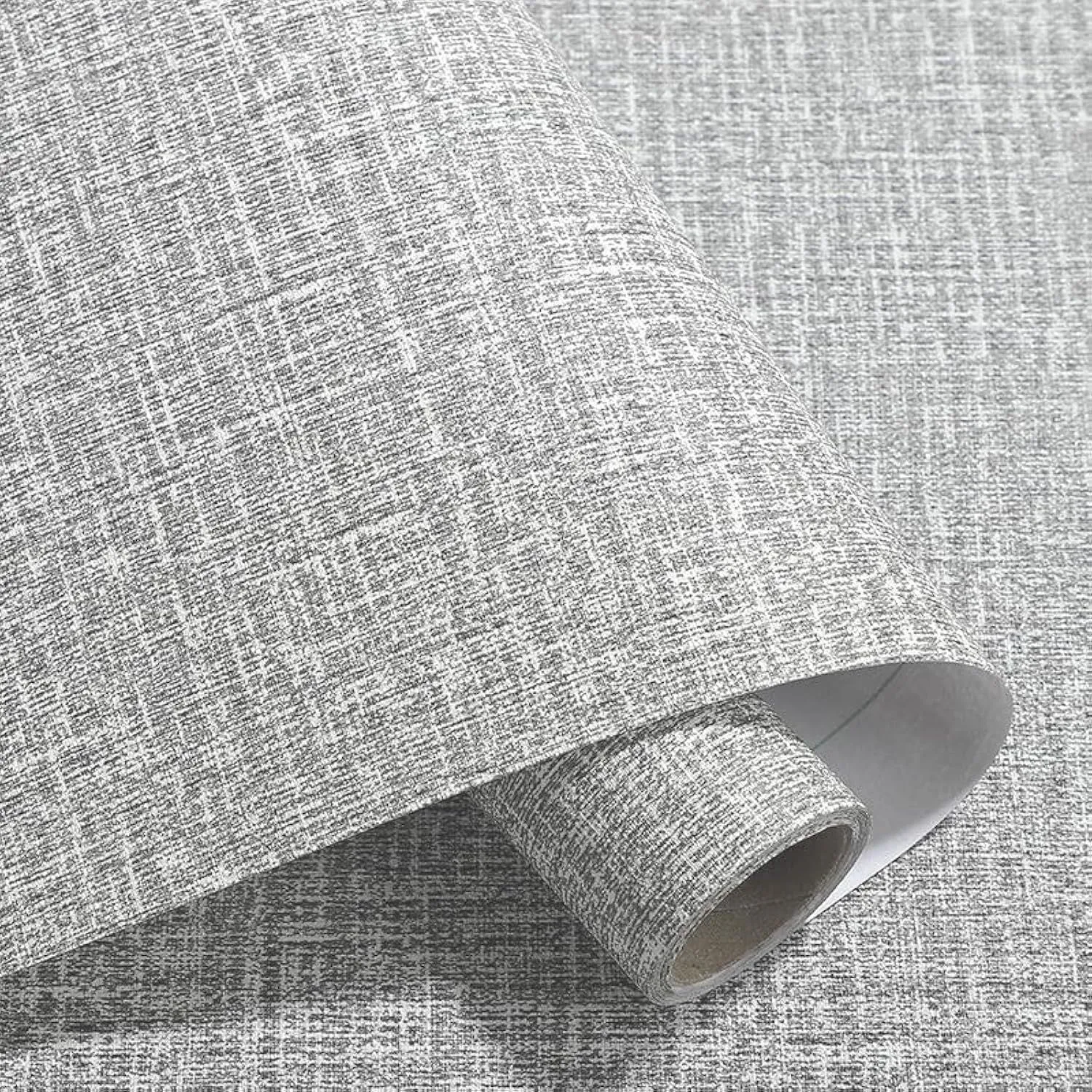 Linen textured self-adhesive wallpaper roll showing grey colour option with measurement diagram