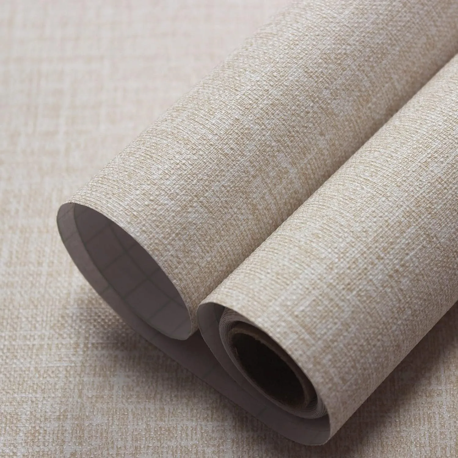 Linen textured self-adhesive wallpaper roll showing grey colour option with measurement diagram