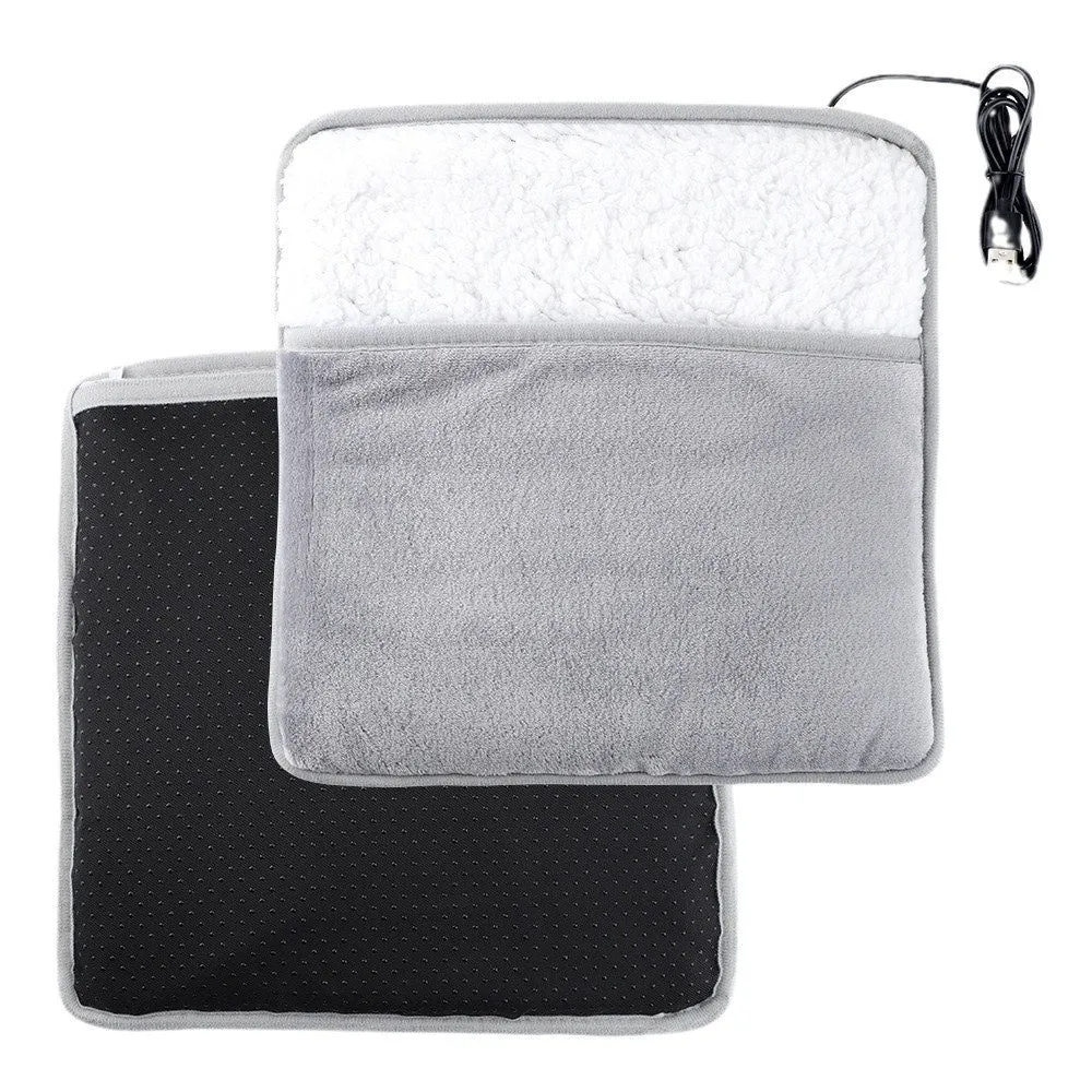 Grey USB heating feet warmer with cord and mechanical switch on floor
