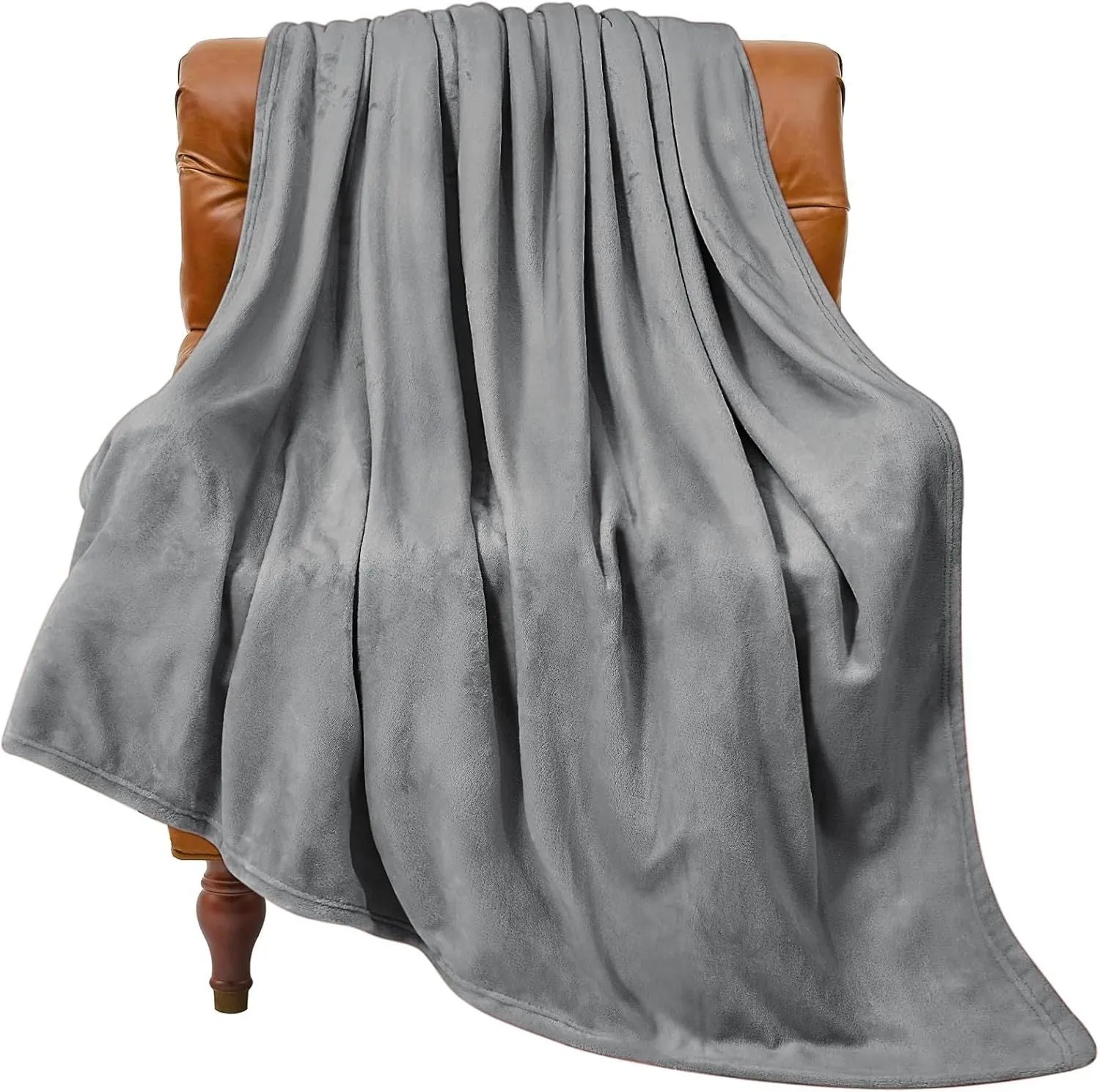Light gray coral flannel polyester air conditioning blanket folded on a neutral background