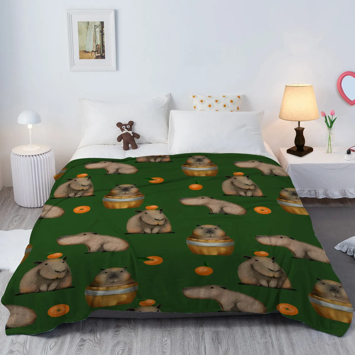 Flannel orange and capybara pattern soft fluffy multifunctional printed blanket on sofa
