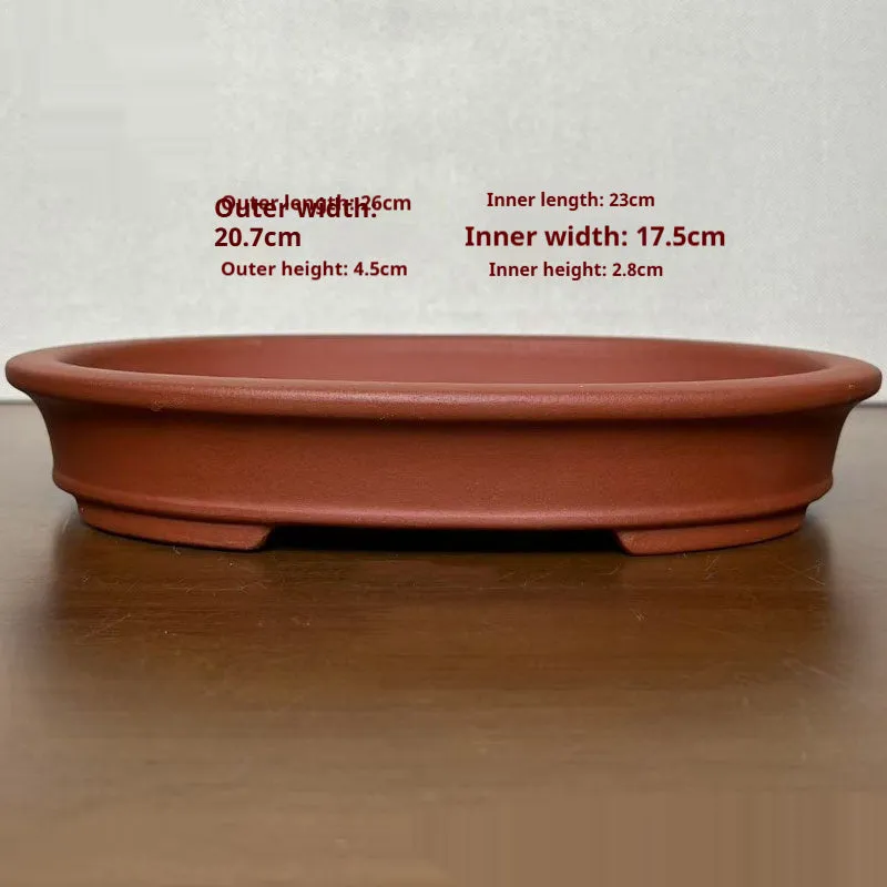 Purple sand handmade oval ceramic flowerpot in cinnabar sand colour for desktop or floor plant display