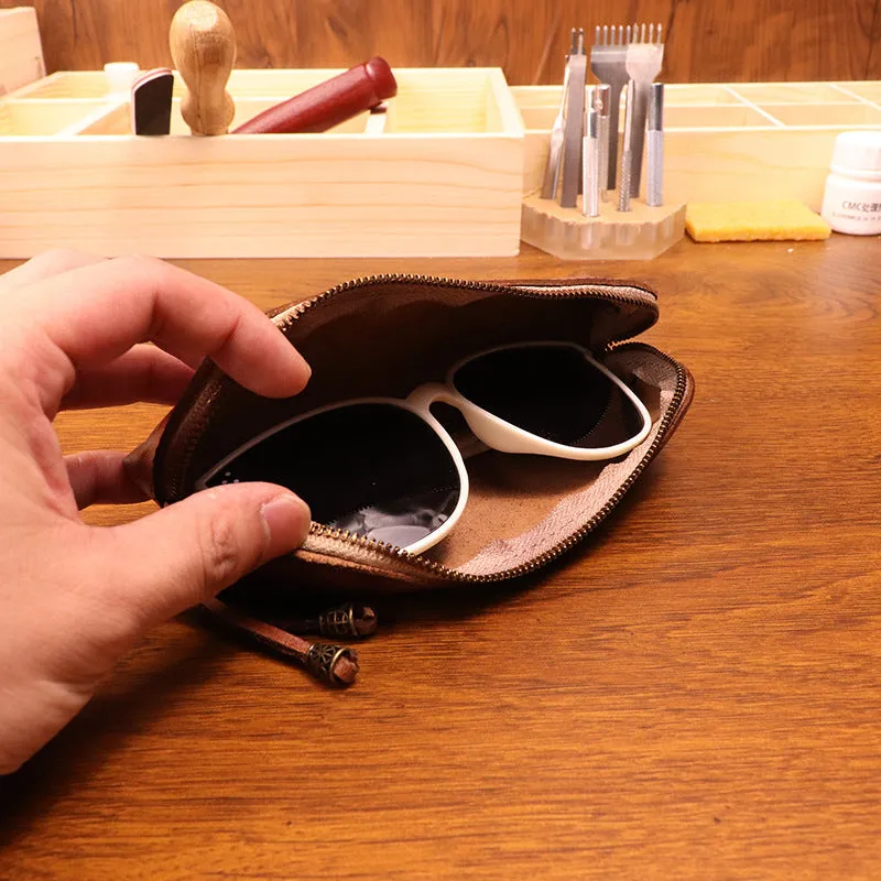 First layer cowhide leather glasses buggy bag in black colour on a neutral background