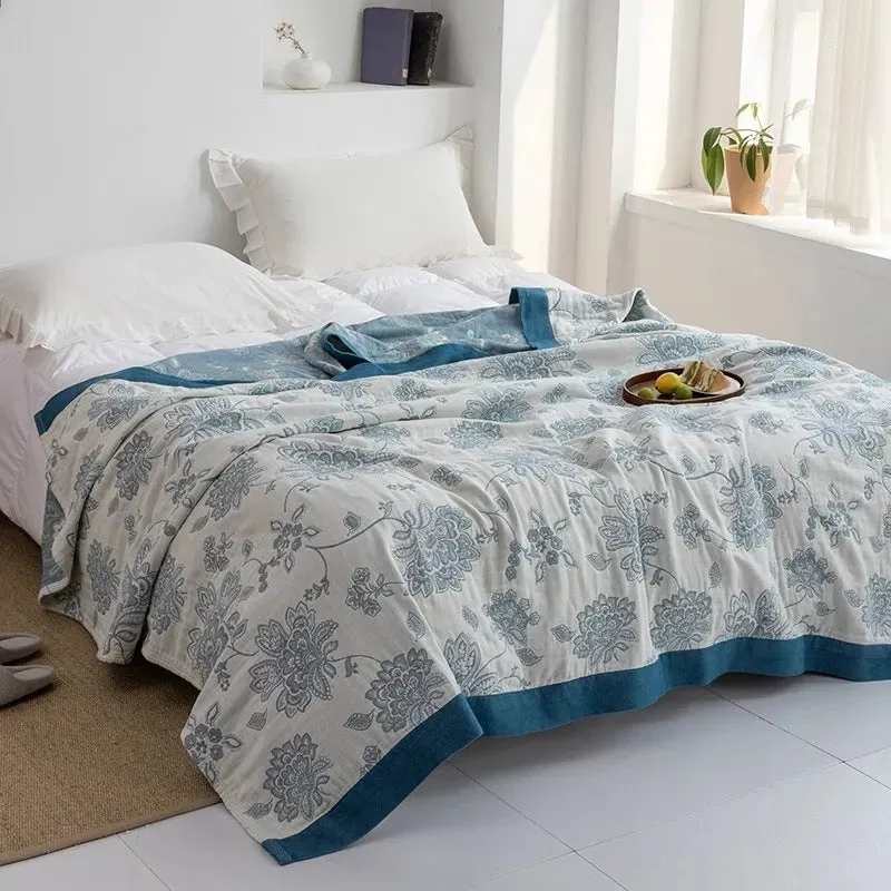 Pure cotton five-layer gauze bed blanket in modern simplicity style, shown in blue colour.
