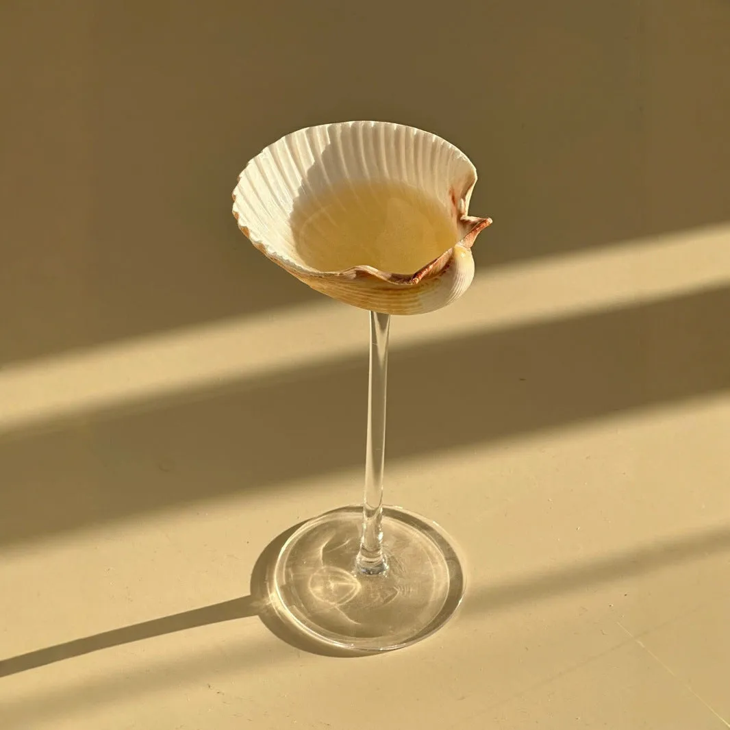 Handmade glass water cup with creative conch shell design in style A