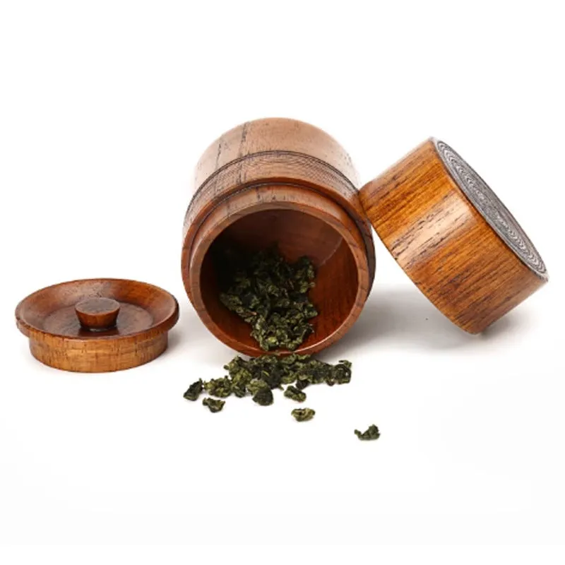 Hand-painted jujube wood sealed tea container with 200ml capacity on a wooden surface