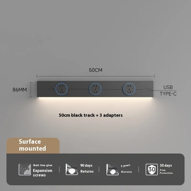 Induction lamp rail socket in black on a sideboard cabinet track with white background
