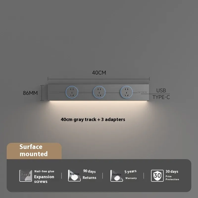 Induction lamp rail socket in black on a sideboard cabinet track with white background
