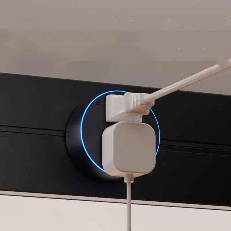 Induction lamp rail socket in black on a sideboard cabinet track with white background