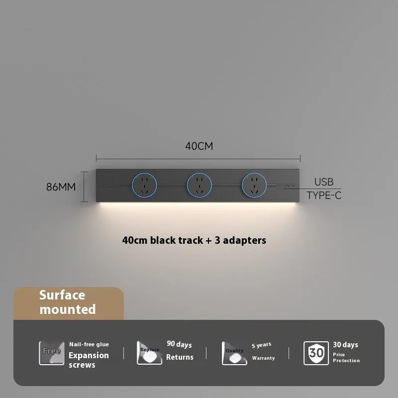 Induction lamp rail socket in black on a sideboard cabinet track with white background
