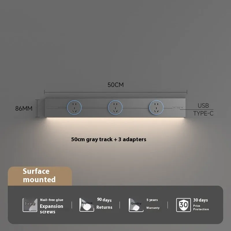 Induction lamp rail socket in black on a sideboard cabinet track with white background