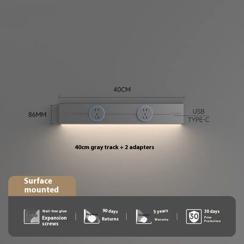 Induction lamp rail socket in black on a sideboard cabinet track with white background