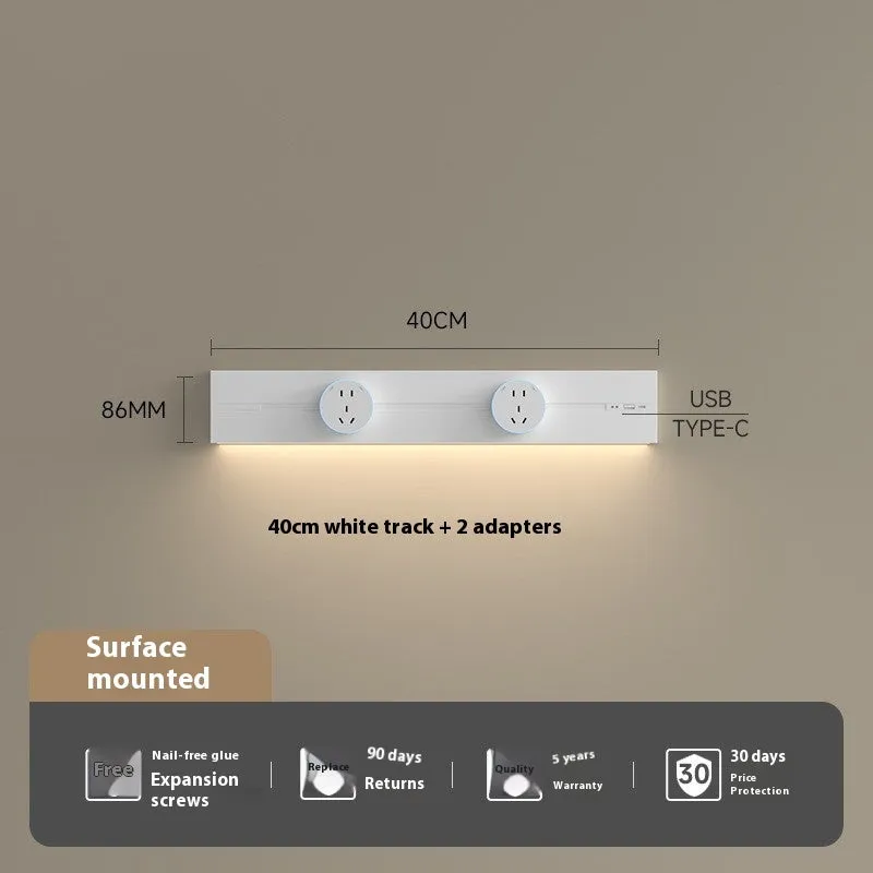 Induction lamp rail socket in black on a sideboard cabinet track with white background