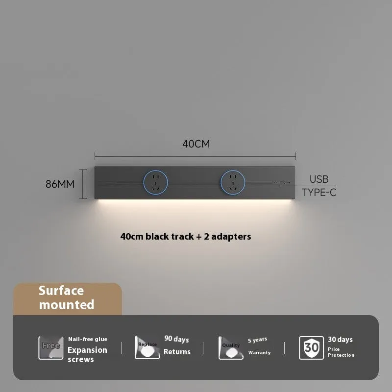 Induction lamp rail socket in black on a sideboard cabinet track with white background