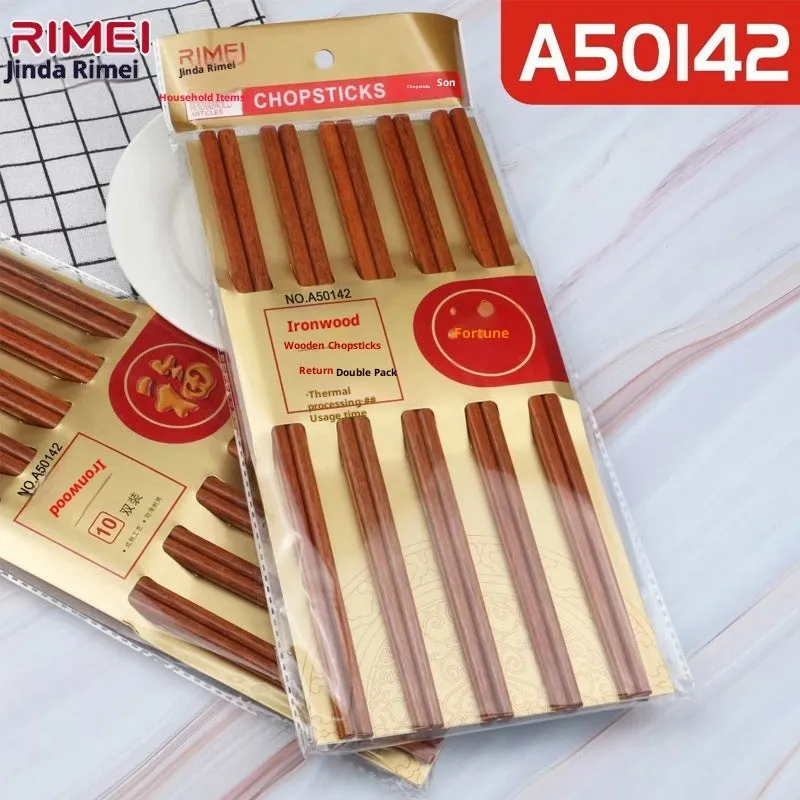 10 pairs of solid colour bamboo chopsticks on a plain surface, household kitchen use