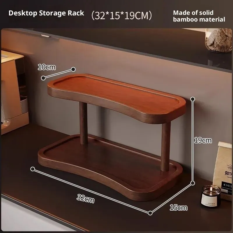 Two-layer bamboo cup storage rack on a tabletop with small items organised on both tiers