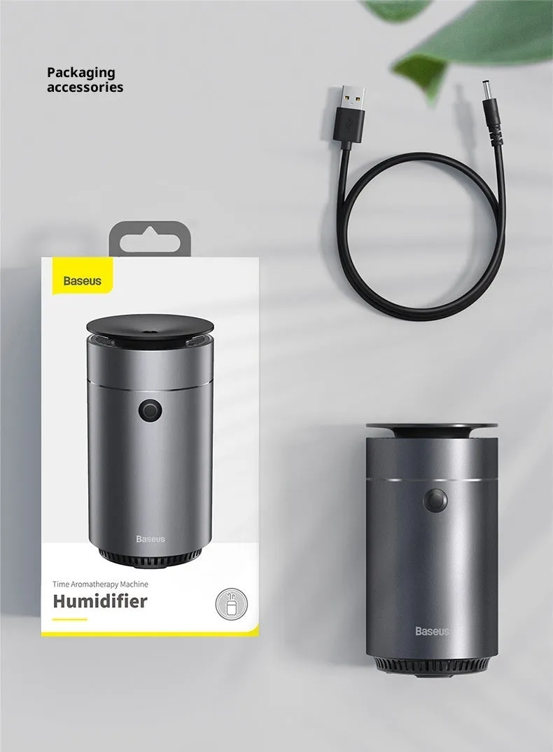 Mini car heavy fog aromatherapy humidifier in dark grey column shape with USB cable