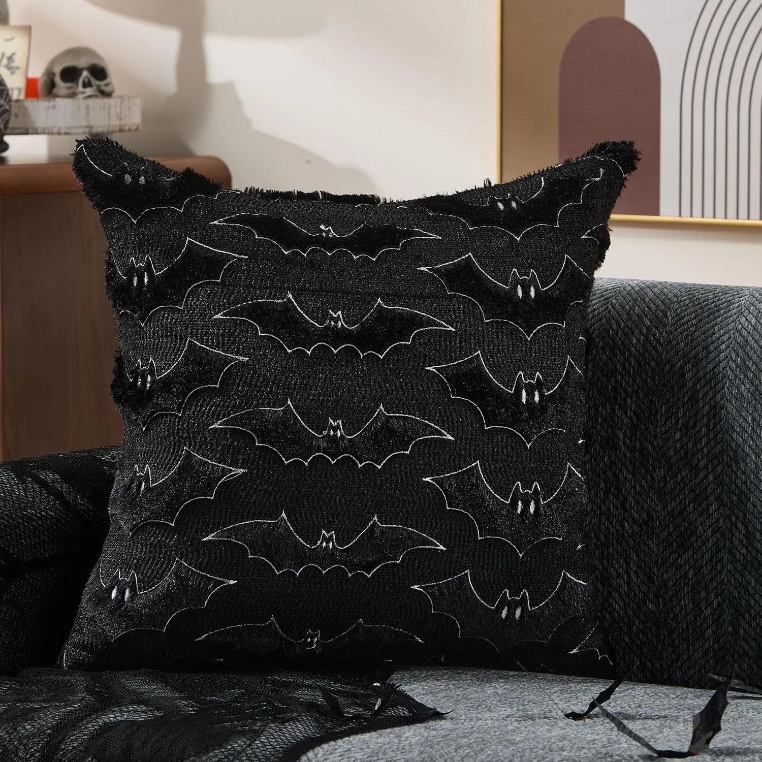 Plush stereo ghost embroidered black and white holiday decorative cushion cover 45x45cm on sofa