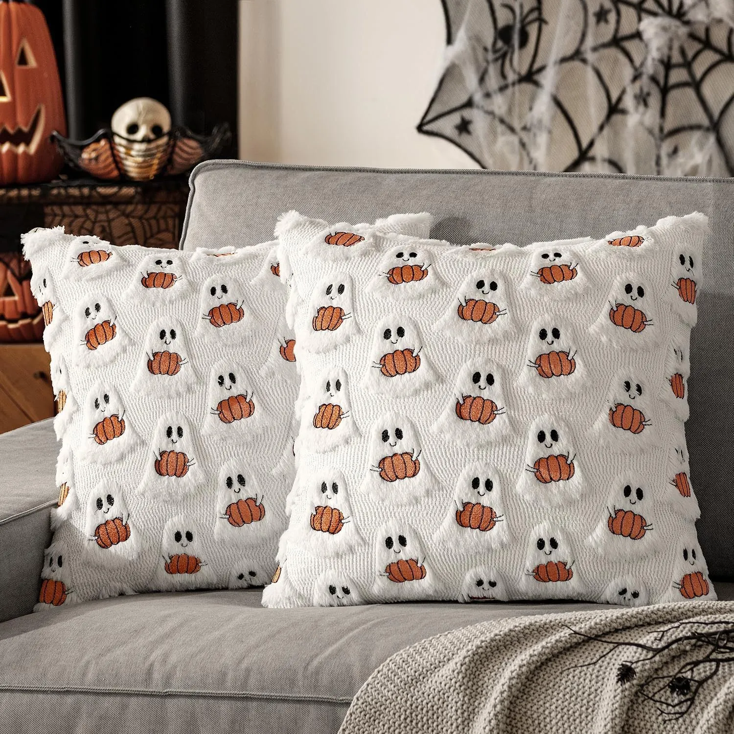 Plush stereo ghost embroidered black and white holiday decorative cushion cover 45x45cm on sofa